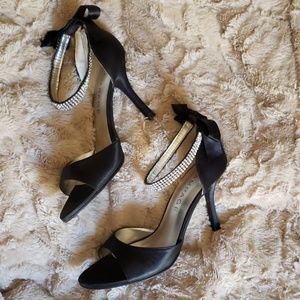 Black satin heels between 3" and 4"